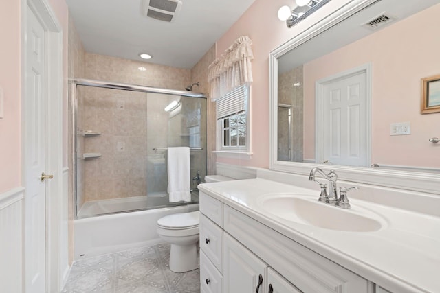 14 Hillside Ave, Saint James, NY 11780 - full bath featuring toilet, vanity, enclosed tub / shower combo, and tile patterned flooring