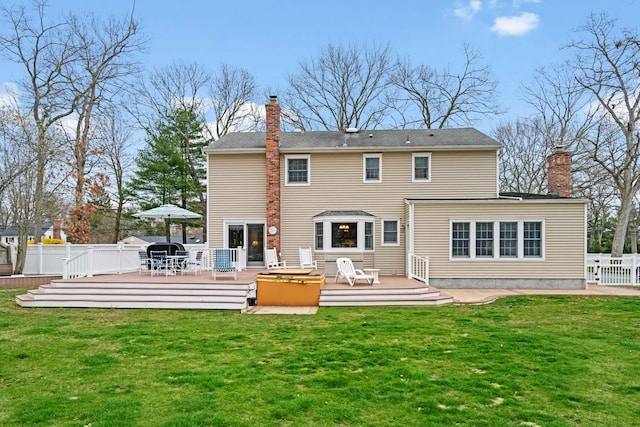 14 Hillside Ave, Saint James, NY 11780 - rear view of property featuring a chimney and a deck