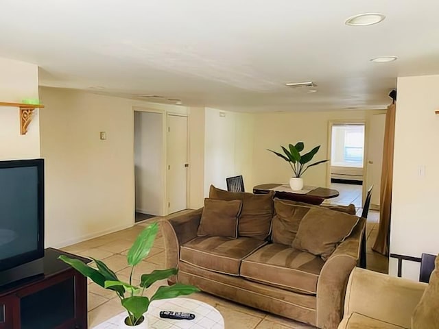 119 Mitchell Ave, Long Beach, NY 11561 - living room featuring recessed lighting and light tile patterned flooring