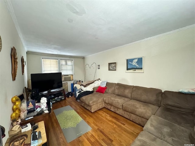133-25 Blossom Ave, Flushing, NY 11355 - living area featuring ornamental molding, cooling unit, and wood finished floors