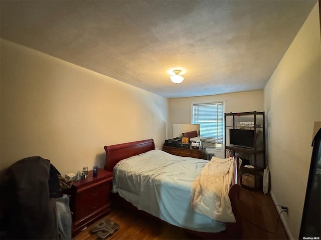133-25 Blossom Ave, Flushing, NY 11355 - bedroom featuring dark wood-style floors
