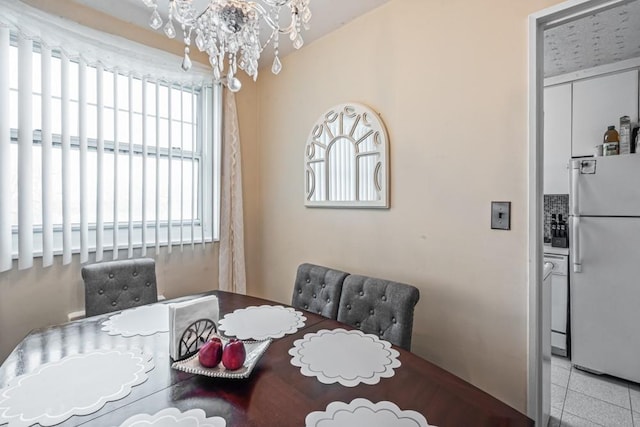 58-30 251st St Unit 2Nd, Little Neck, NY 11362 - dining area featuring tile patterned floors and a notable chandelier