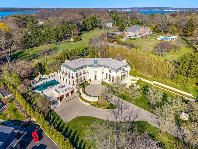186 Kings Point Rd, Great Neck, NY 11024 - drone / aerial view of a pool area and a nearby body of water