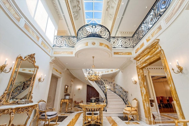 186 Kings Point Rd, Great Neck, NY 11024 - community lobby with a towering ceiling, stairs, and ornamental molding