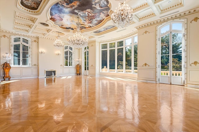 186 Kings Point Rd, Great Neck, NY 11024 - exercise room featuring a chandelier, coffered ceiling, a decorative wall, crown molding, and a high ceiling