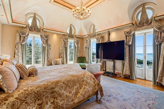 186 Kings Point Rd, Great Neck, NY 11024 - bedroom featuring a chandelier and wood finished floors