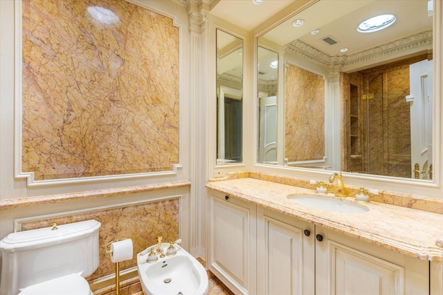 186 Kings Point Rd, Great Neck, NY 11024 - bathroom featuring vanity, toilet, and a bidet