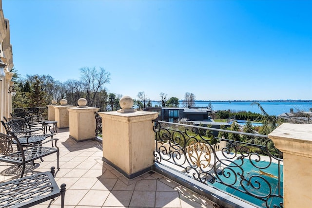 186 Kings Point Rd, Great Neck, NY 11024 - view of patio / terrace featuring a balcony and a water view