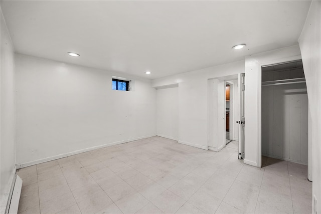 below grade area with recessed lighting and baseboards