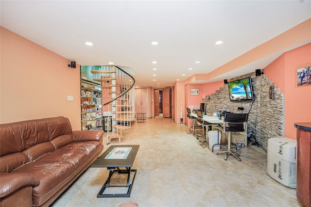 living area featuring stairs and recessed lighting