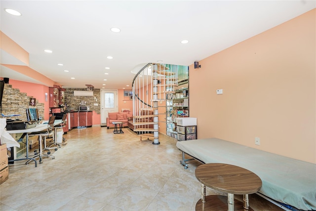 home office featuring a fireplace and recessed lighting