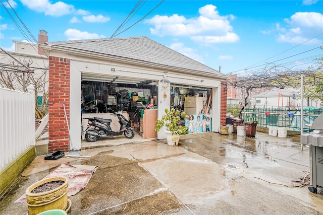 detached garage with fence