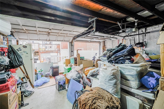 garage featuring a garage door opener