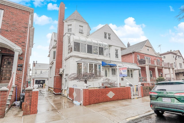 view of front of property with a chimney