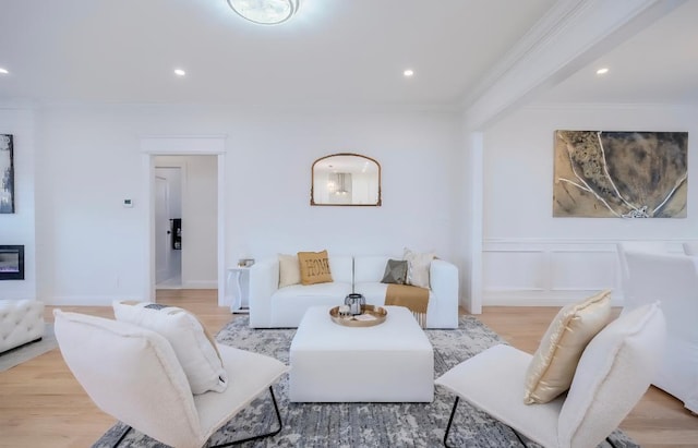 2566 Aster Pl N, Westbury, NY 11590 - living room with ornamental molding, light wood-style flooring, and recessed lighting