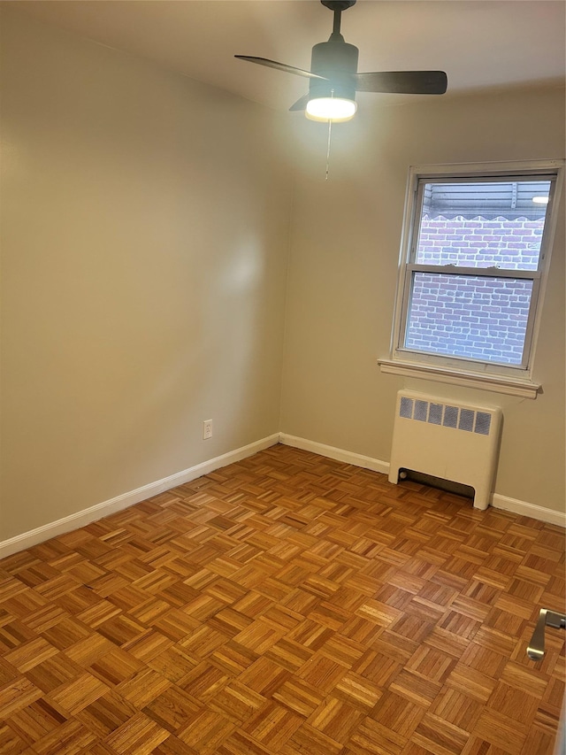 3317 Hone Ave, Bronx, NY 10469 - unfurnished room with radiator heating unit and ceiling fan