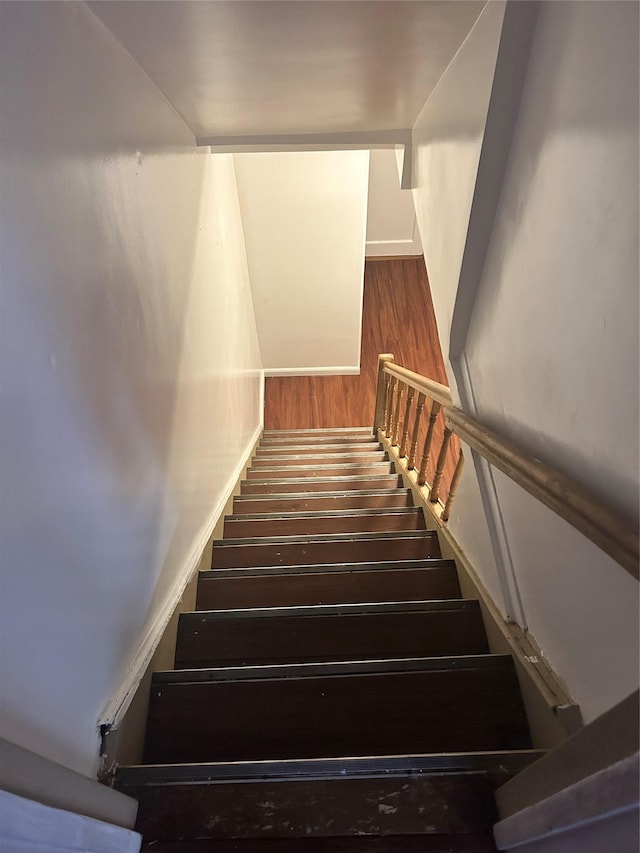 3317 Hone Ave, Bronx, NY 10469 - stairway featuring wood finished floors