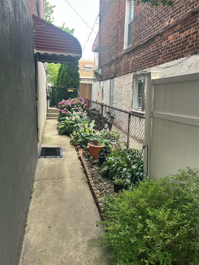3317 Hone Ave, Bronx, NY 10469 - view of side of property featuring brick siding
