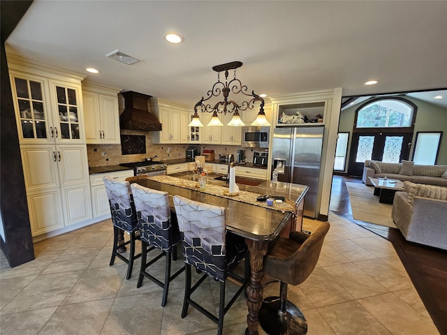 7 Raynham Rd, Glen Cove, NY 11542 - dining room with recessed lighting and light tile patterned floors