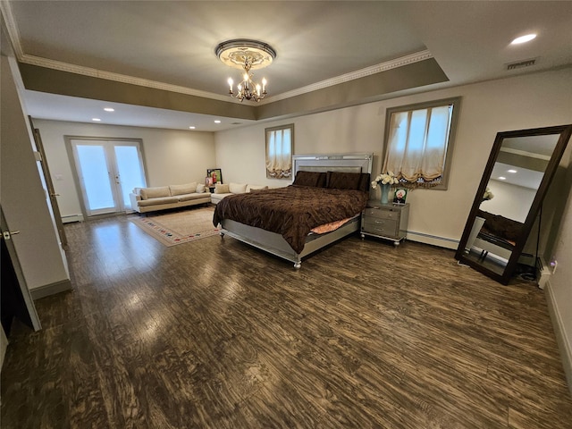 7 Raynham Rd, Glen Cove, NY 11542 - bedroom with crown molding, wood finished floors, a tray ceiling, a chandelier, and baseboards