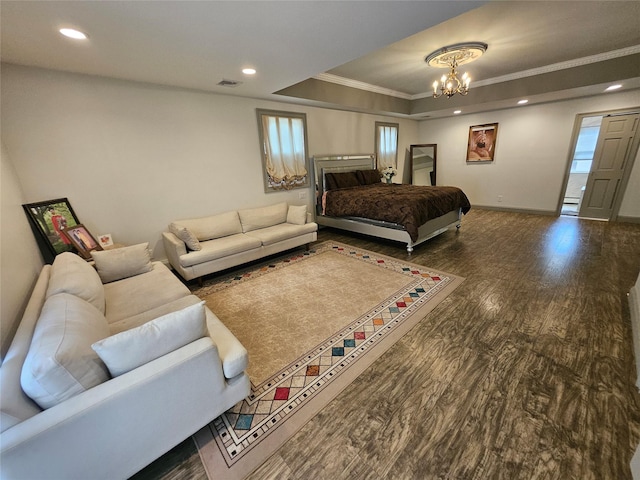 7 Raynham Rd, Glen Cove, NY 11542 - bedroom with crown molding, wood finished floors, a raised ceiling, baseboards, and multiple windows