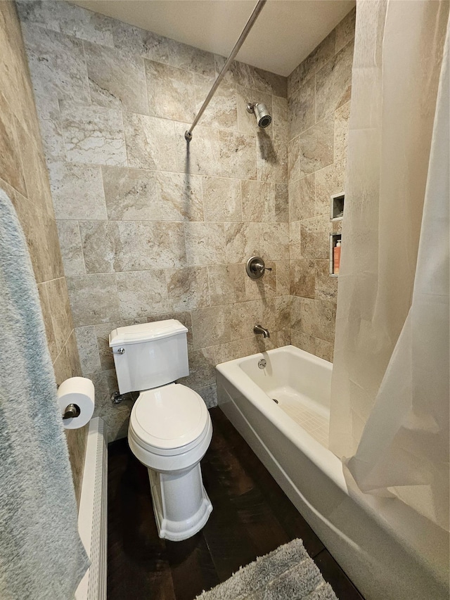 7 Raynham Rd, Glen Cove, NY 11542 - full bathroom featuring toilet, shower / bathtub combination with curtain, and tile walls