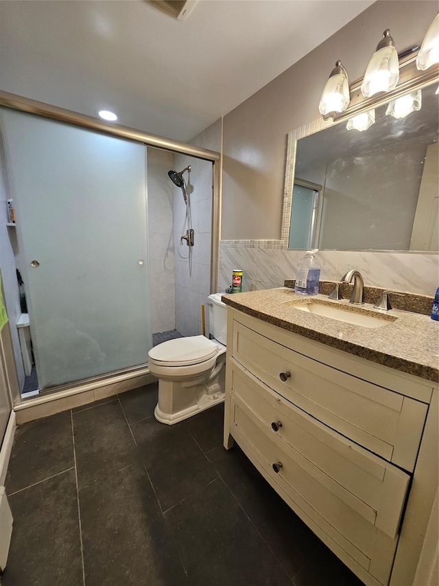 7 Raynham Rd, Glen Cove, NY 11542 - full bath featuring tile walls, tile patterned floors, a stall shower, toilet, and vanity