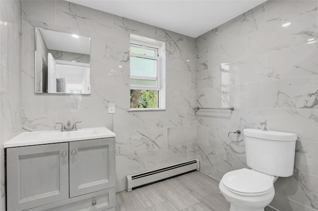 48-35 Clearview Expy, Bayside, NY 11364 - bathroom with a baseboard heating unit, tile walls, and vanity