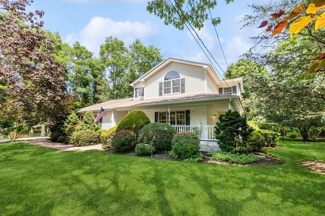 exterior space featuring a yard and a porch