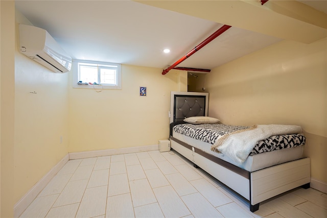 bedroom with baseboards and a wall mounted AC
