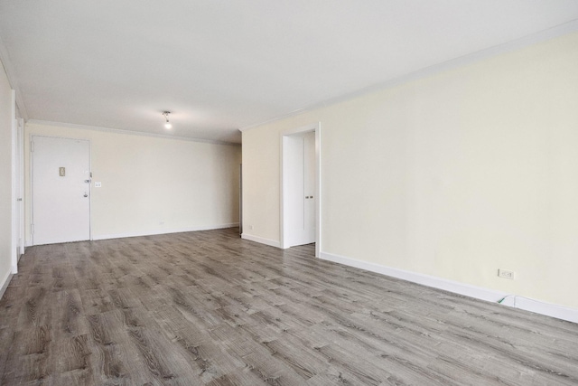 2 Bay Club Dr Unit 17Z2, Bayside, NY 11360 - spare room with wood finished floors and ornamental molding