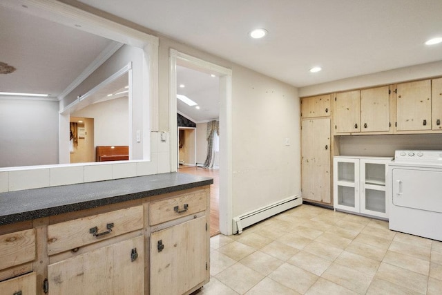 washroom with crown molding, recessed lighting, cabinet space, washer / dryer, and a baseboard heating unit