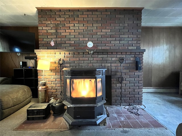 room details with a wood stove and wooden walls