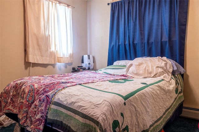 bedroom with a baseboard radiator