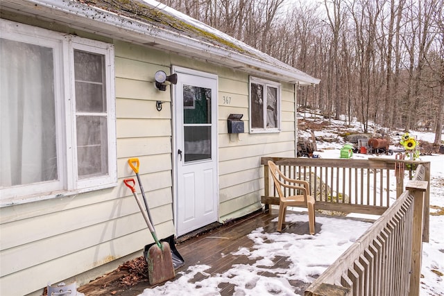 view of snow covered deck