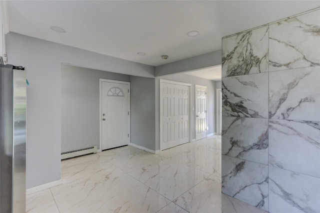 17 Windmill Ln, Levittown, NY 11756 - foyer entrance featuring baseboards, marble finish floor, and baseboard heating