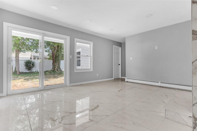 17 Windmill Ln, Levittown, NY 11756 - unfurnished room featuring marble finish floor, baseboards, and a baseboard heating unit