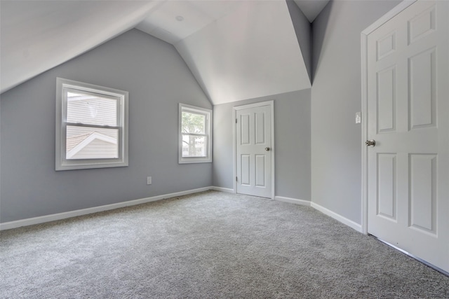 17 Windmill Ln, Levittown, NY 11756 - additional living space with baseboards, lofted ceiling, and carpet flooring