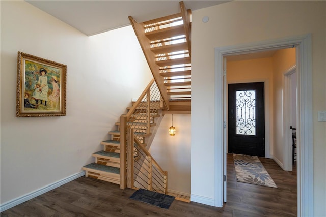 125 S Bay Dr, Babylon, NY 11702 - stairway with wood finished floors and baseboards