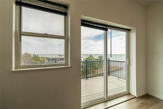 125 S Bay Dr, Babylon, NY 11702 - entryway featuring wood finished floors and baseboards