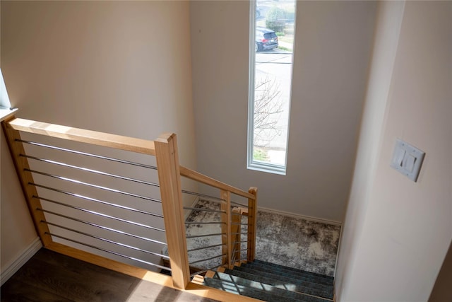 125 S Bay Dr, Babylon, NY 11702 - staircase with wood finished floors and baseboards
