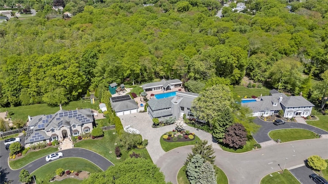 10 Crick Holly Ln, East Islip, NY 11730 - aerial view of property's location with a pool and a forest