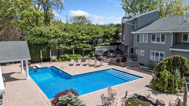 10 Crick Holly Ln, East Islip, NY 11730 - outdoor pool with a patio