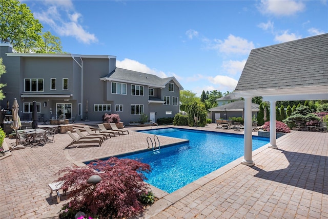 10 Crick Holly Ln, East Islip, NY 11730 - outdoor pool featuring a patio and a gazebo