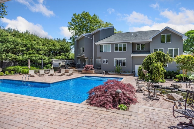 10 Crick Holly Ln, East Islip, NY 11730 - swimming pool with a patio area