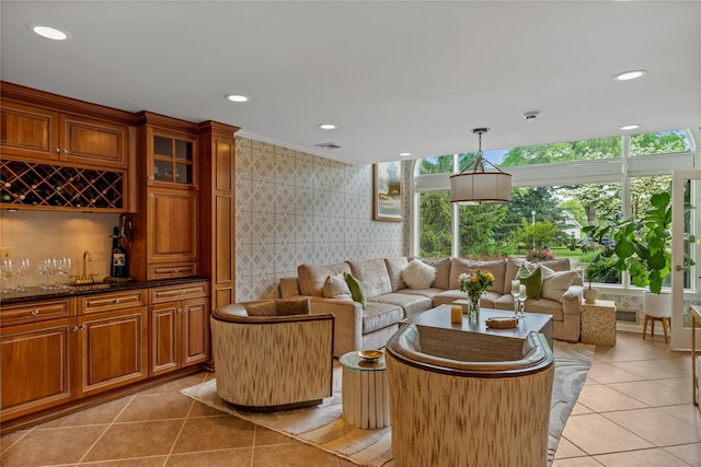 10 Crick Holly Ln, East Islip, NY 11730 - living room with wet bar, light tile patterned floors, and recessed lighting