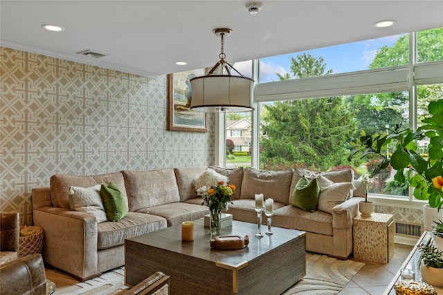 10 Crick Holly Ln, East Islip, NY 11730 - living room featuring wallpapered walls, healthy amount of natural light, crown molding, and recessed lighting