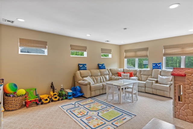10 Crick Holly Ln, East Islip, NY 11730 - carpeted living room featuring recessed lighting