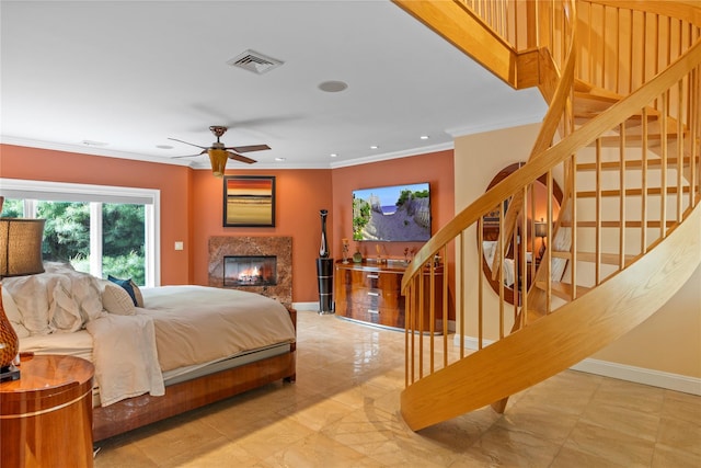10 Crick Holly Ln, East Islip, NY 11730 - bedroom with ornamental molding, a glass covered fireplace, baseboards, recessed lighting, and light marble finish floors