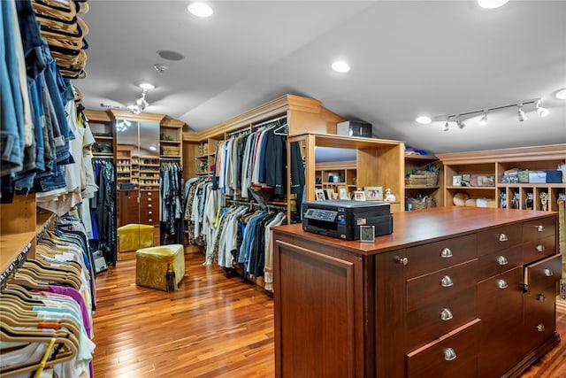 10 Crick Holly Ln, East Islip, NY 11730 - spacious closet with wood finished floors and vaulted ceiling